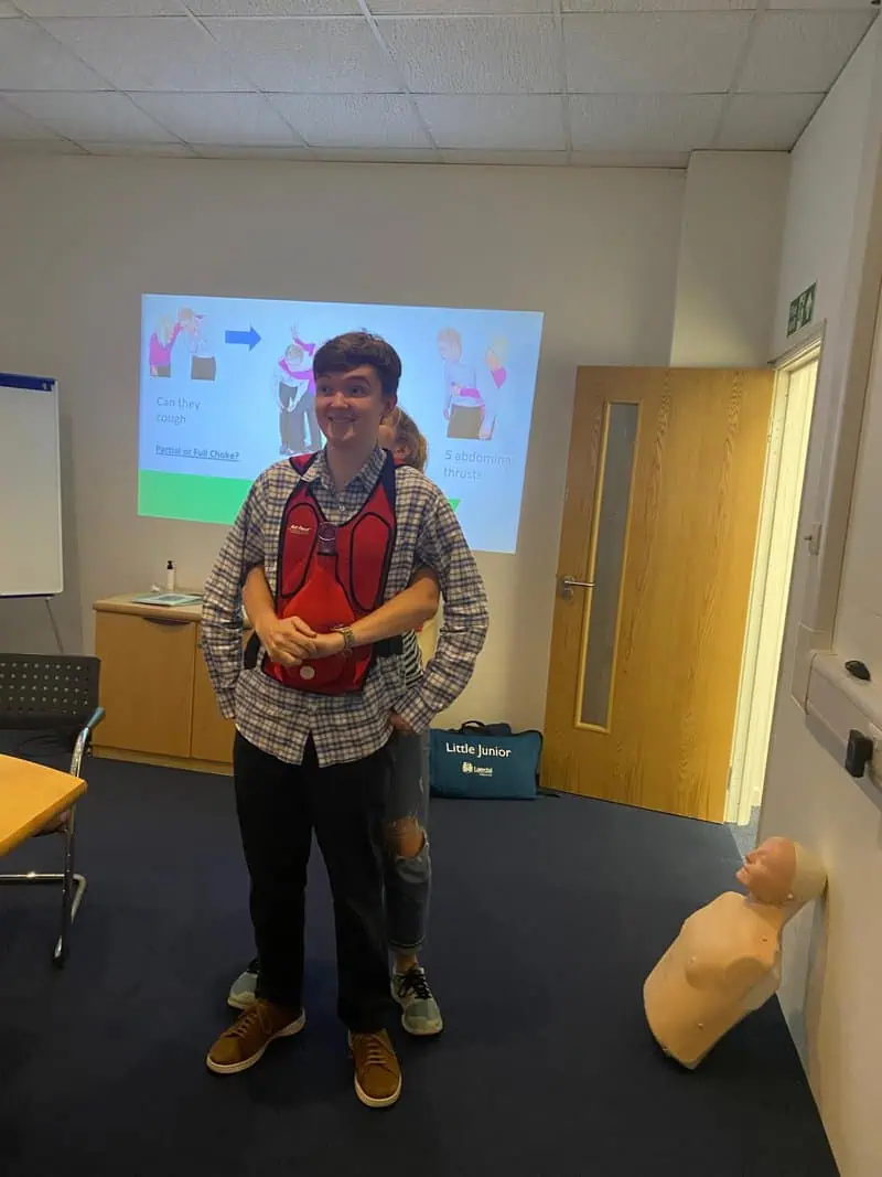 First aid trainees listening to instructions